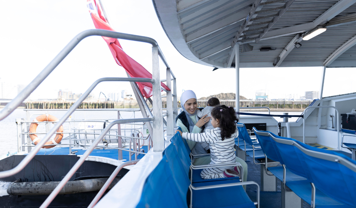 Uber Boat by Thames Clippers - mother with child